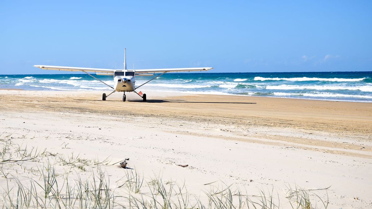 Small aircraft arriving at a Fraser Island airstrip in Australia