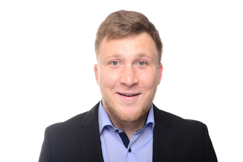 Portrait of Christian Boehme with a framed profile image